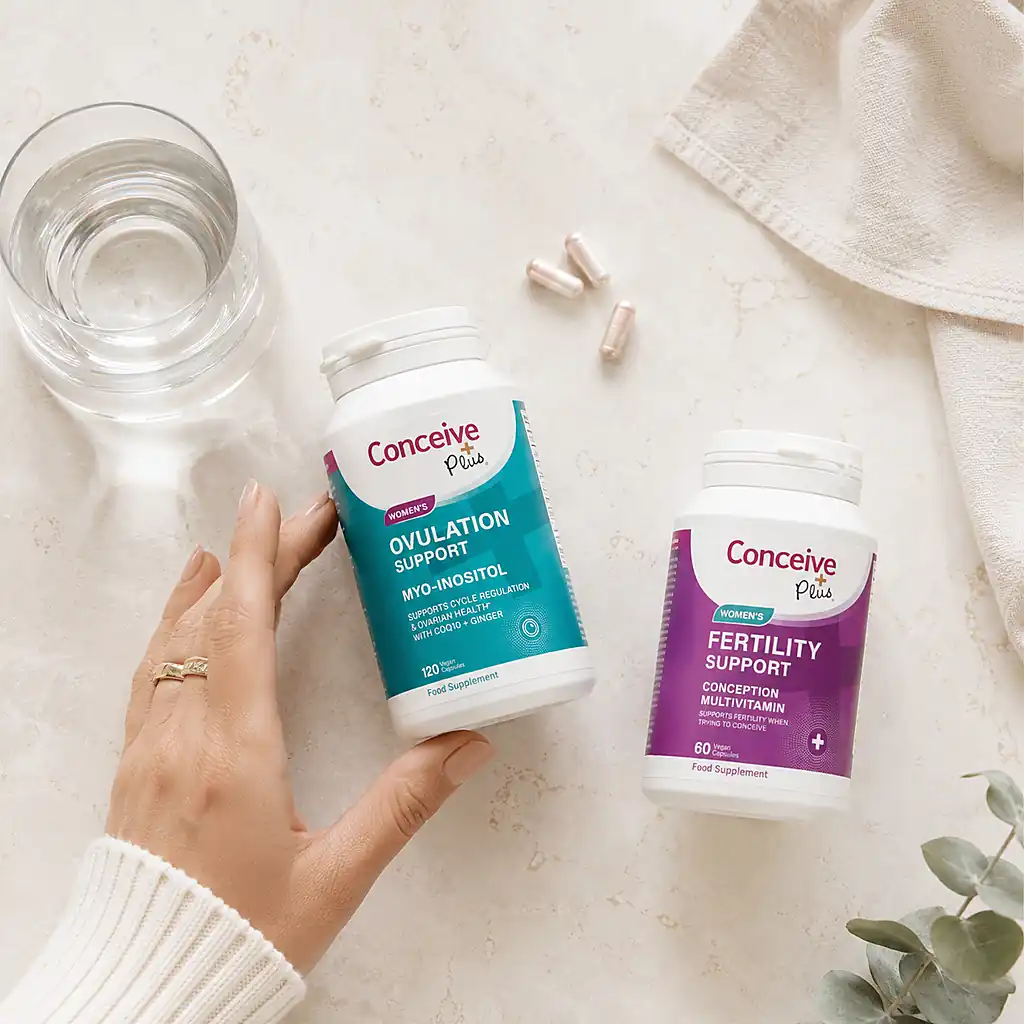 Conceive Plus women’s fertility and ovulation supplements flat lay in Australia