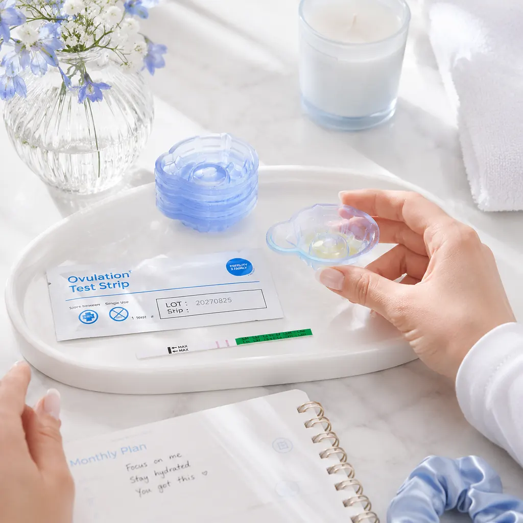 Urine collection cups with home test supplies and cycle plan