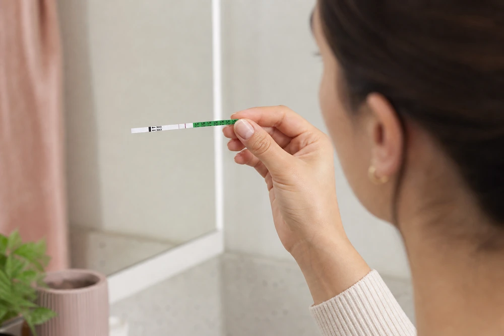 Egg-white cervical mucus with a negative LH ovulation test and conflicting fertile signs in Australia