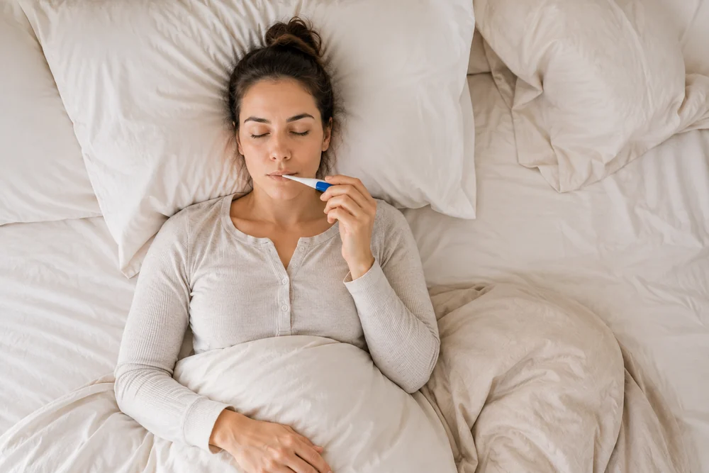 Illustration of a basal body temperature morning routine for BBT charting in Australia