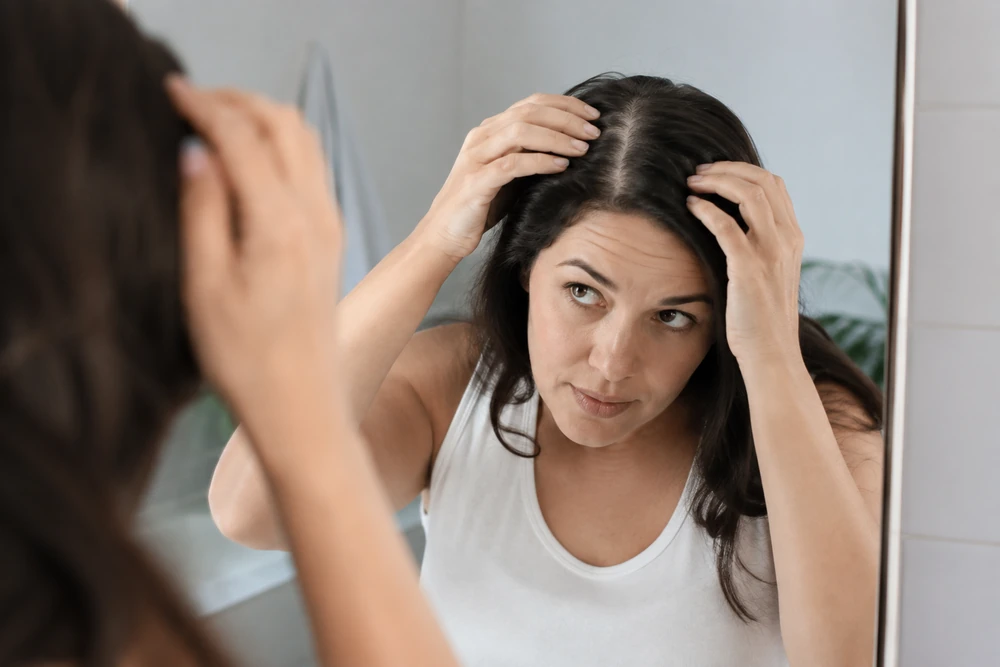 Scalp hair thinning as a possible androgen-related PMOS or PCOS symptom in Australia